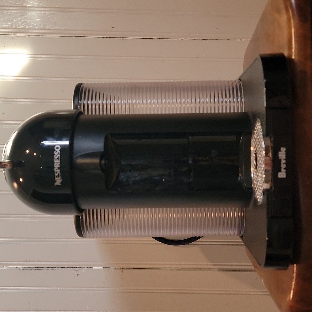Gently used brand new condition, Nespresso Vertuo by Breville-Black.